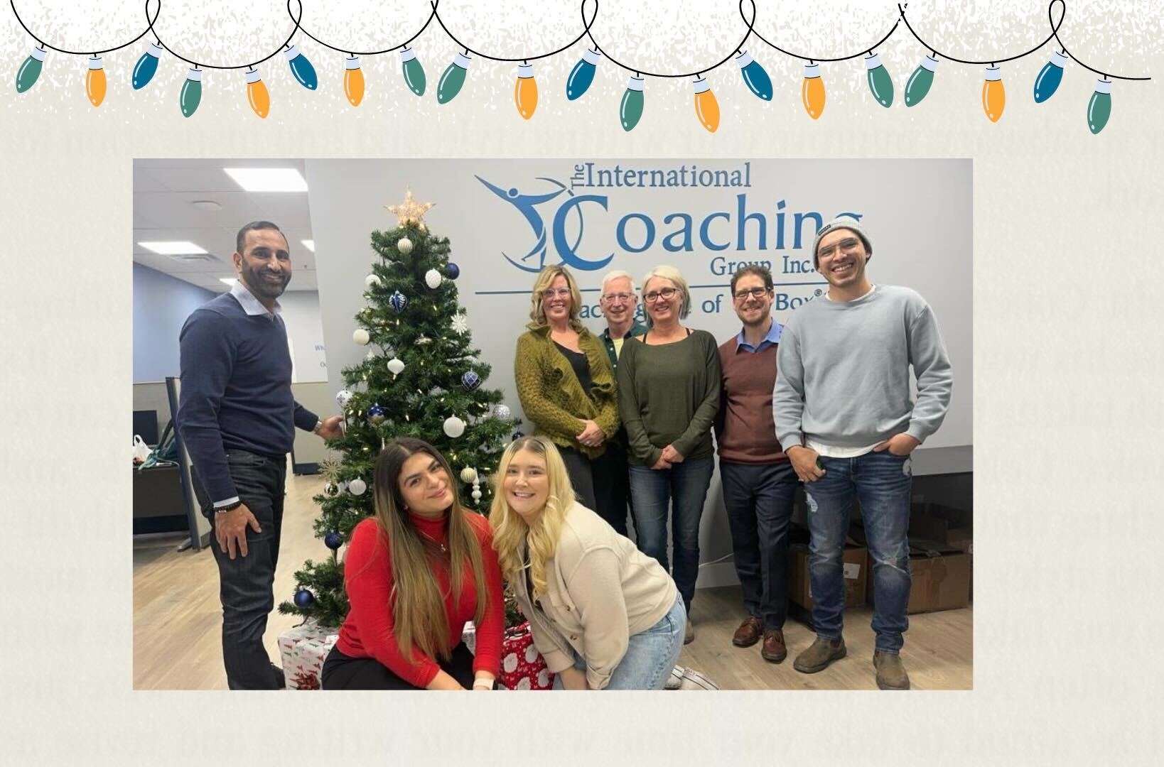 festive happy holidays photos of the International Coaching Group Team around the Christmas tree